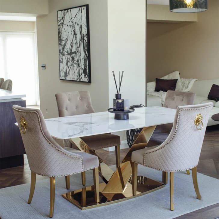 Set of dining chairs with gold legs