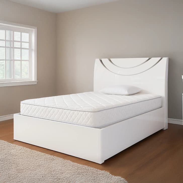 White double bed with storage